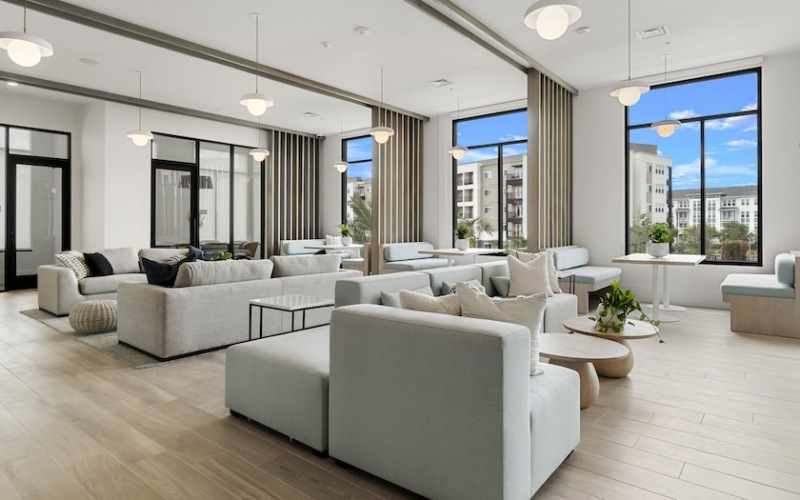 Expansive Clubhouse Seating Area with couches and large windows